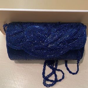 Royal blue evening bag. Can be used with matching chain or tucked in as a clutch